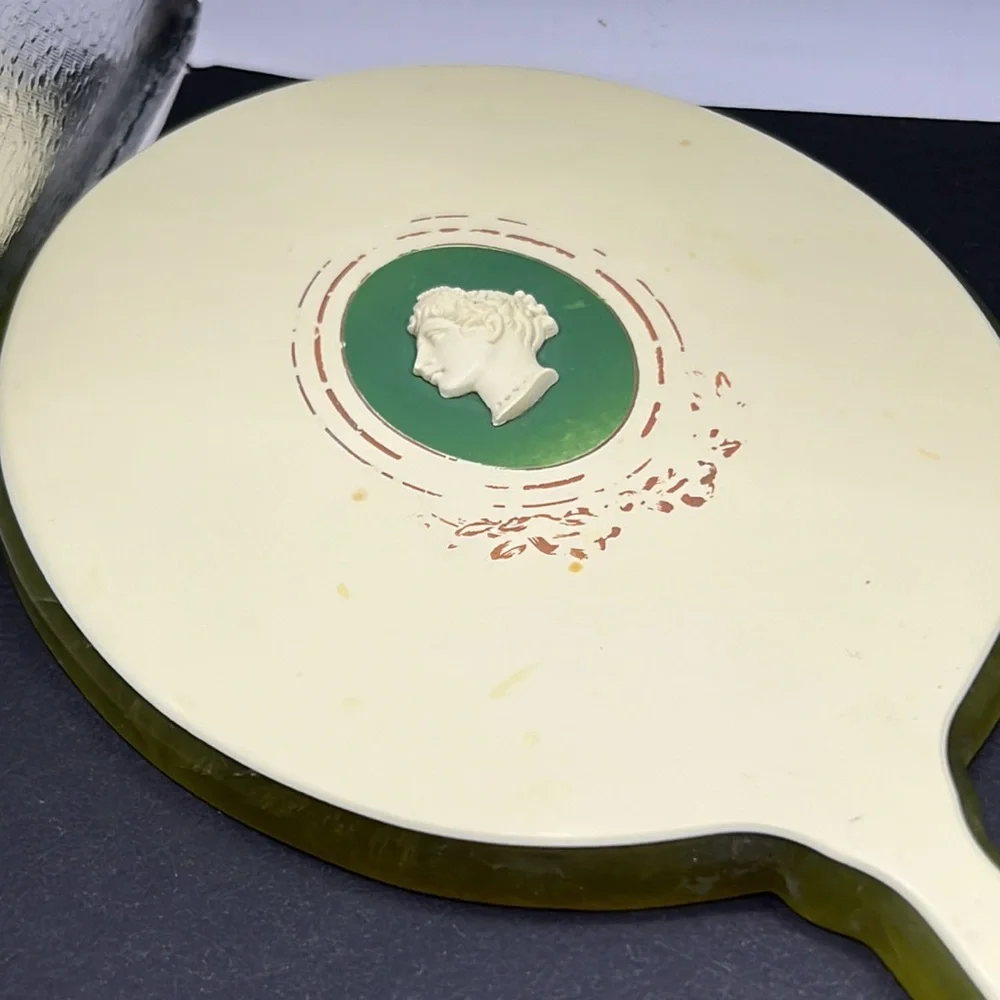 Vintage green celluloid hand mirror and comb set
